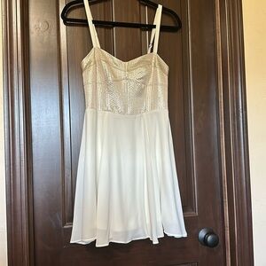 Express dress - size 4 - worn once - cream color with gold bust